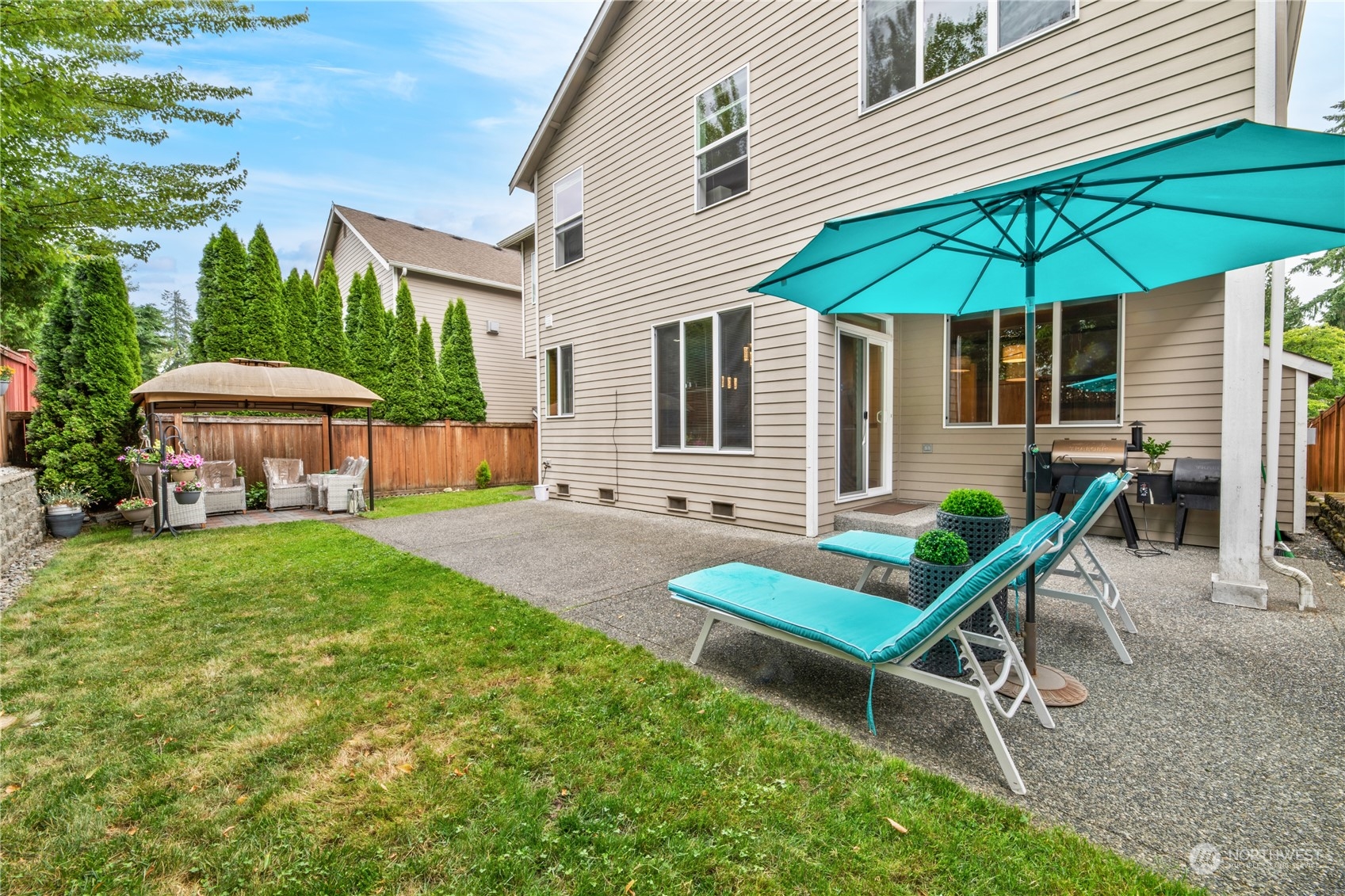 3521 214th Place Southeast Bothell, WA 98021 - Photo 29 of 35 a view of house with backyard and outdoor seating