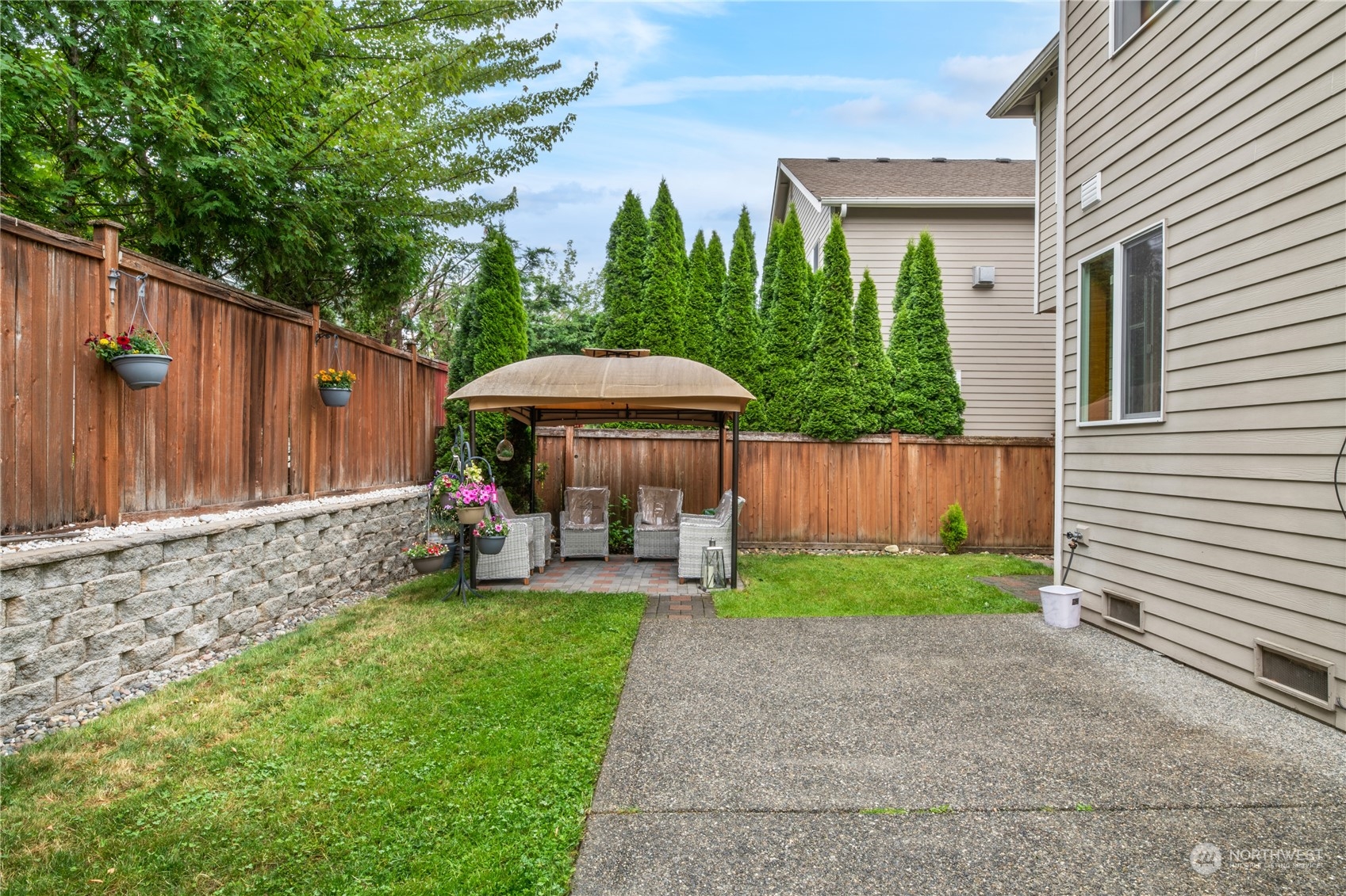 3521 214th Place Southeast Bothell, WA 98021 - Photo 30 of 35 a view of a house with backyard and sitting area