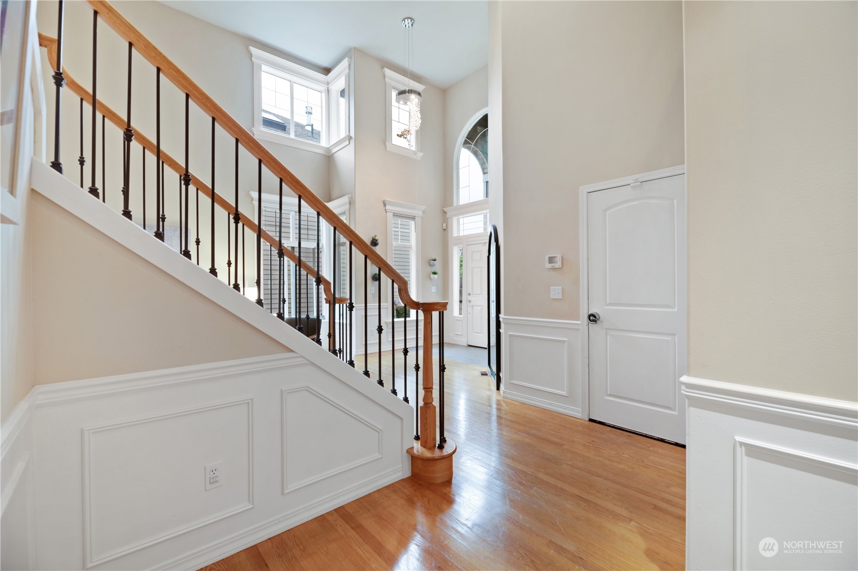 3521 214th Place Southeast Bothell, WA 98021 - Photo 6 of 35 a view of staircase with railing and white walls