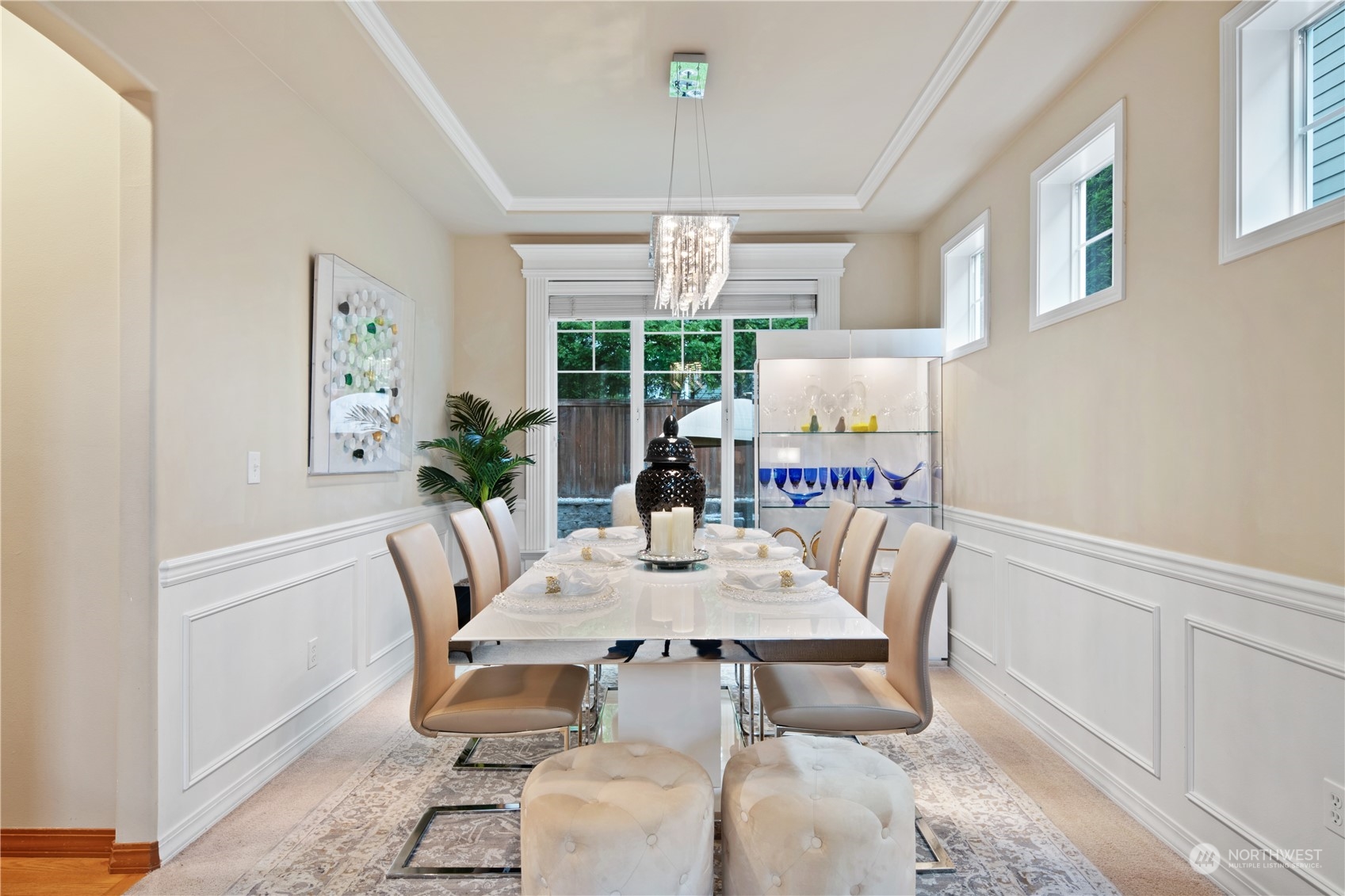 3521 214th Place Southeast Bothell, WA 98021 - Photo 8 of 35 a dining room with furniture a chandelier and wooden floor