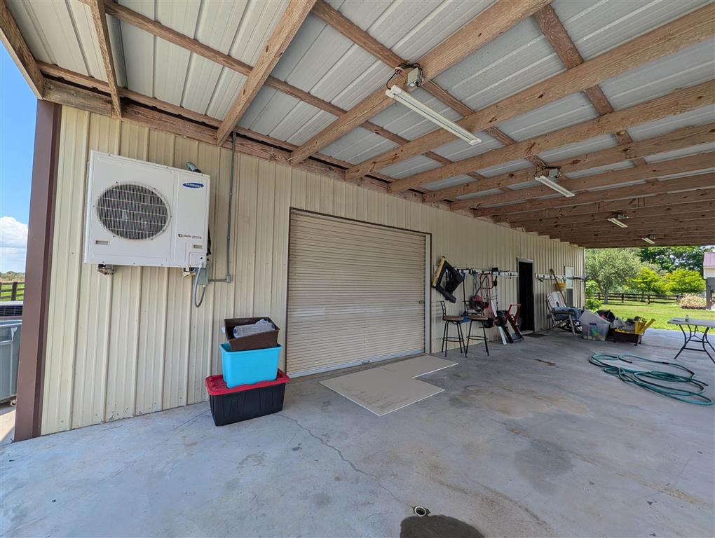 11480 Blanchard Road Welsh, LA 70591 - Photo 41 of 48 Covered concrete back porch to mancave