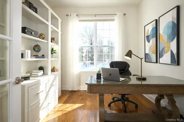 a room with furniture and a window