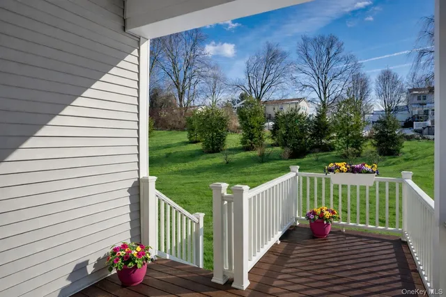 a view of a two chairs on the deck