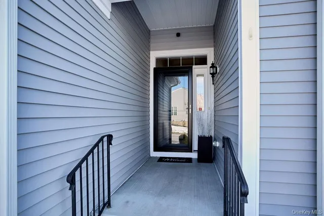 a view of a house with a snow in the yard