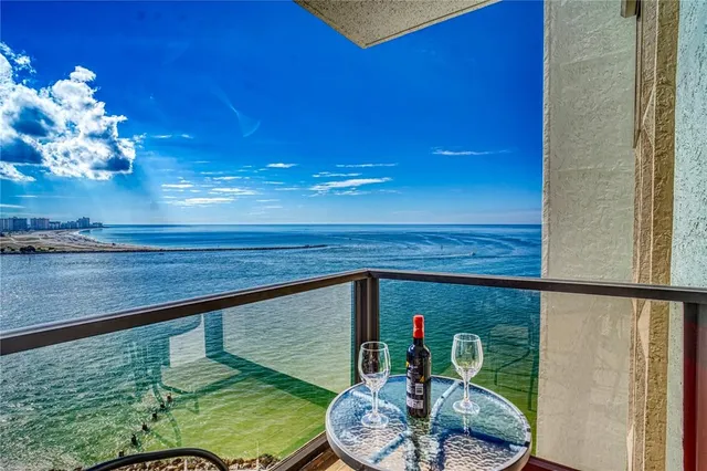 a room with lots of potted plants