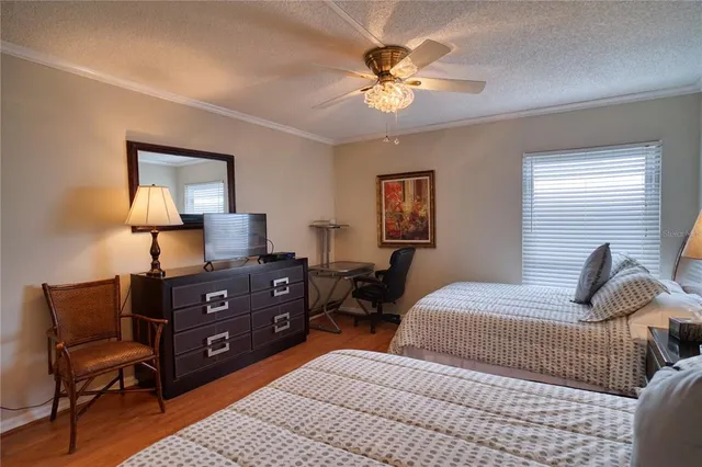a en suite bathroom with a sink double vanity and mirror