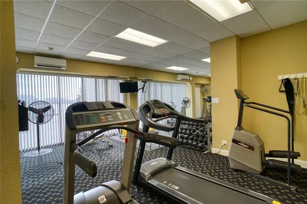 a view of a room with gym equipment