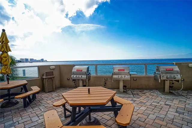 a view of swimming pool from a balcony