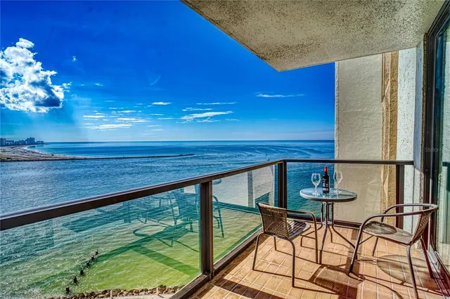 a view of a living room and floor to ceiling window or living room