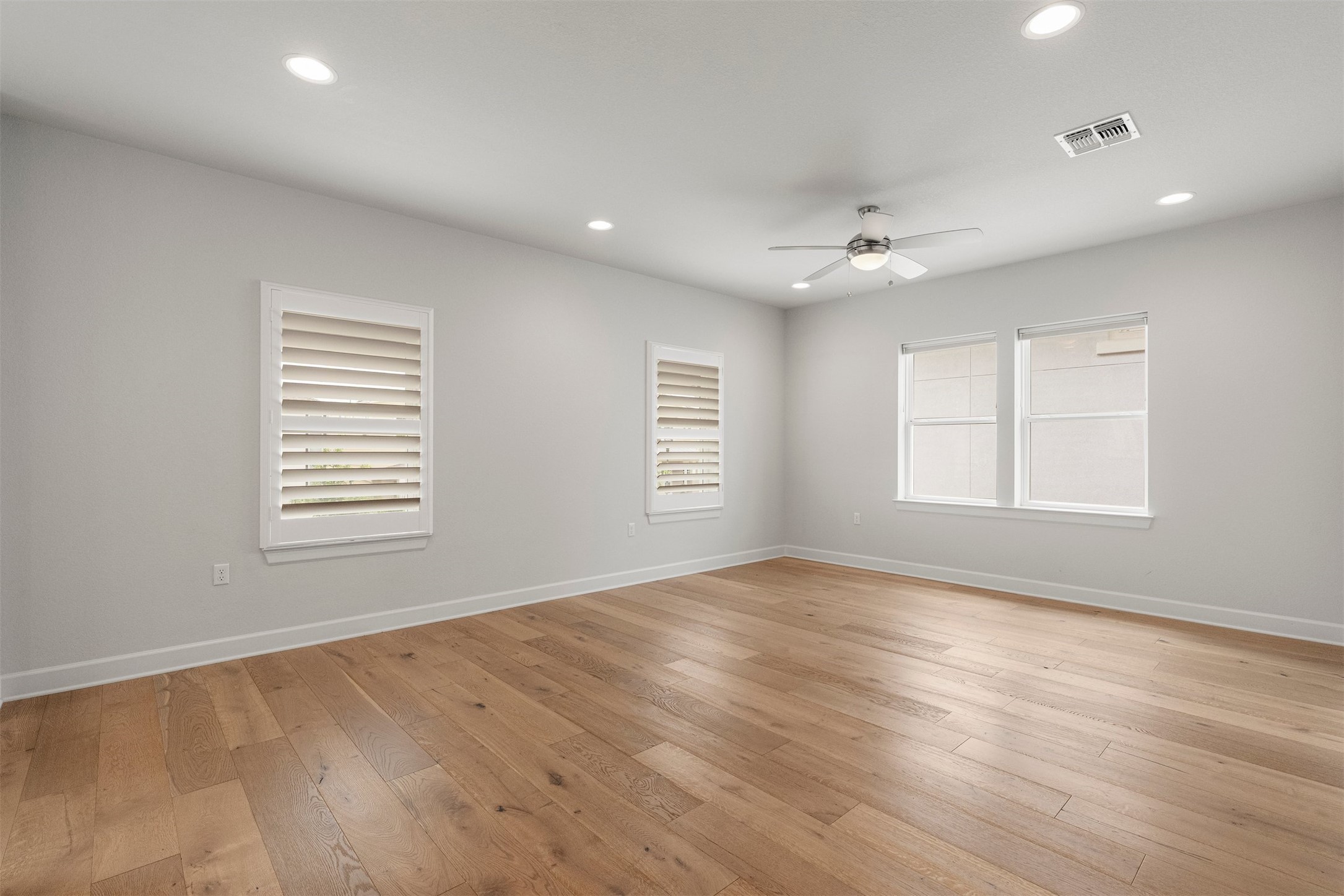 4313 Vaughan Street Austin, TX 78723 - Photo 26 of 39 The entire upstairs layout opens into this large second living room loft, creating an ideal bonus game room or media zone
