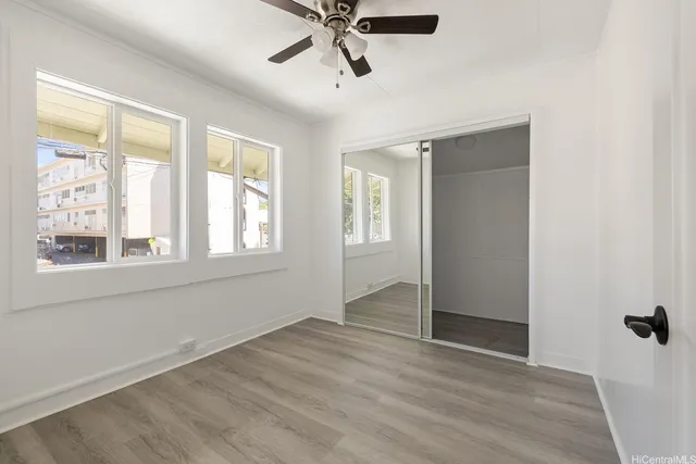 a view of an empty room with a window