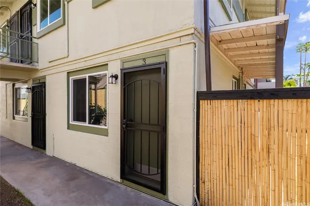 a view of a door and a window