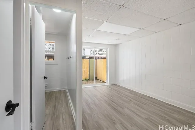 a view of an empty room with a window