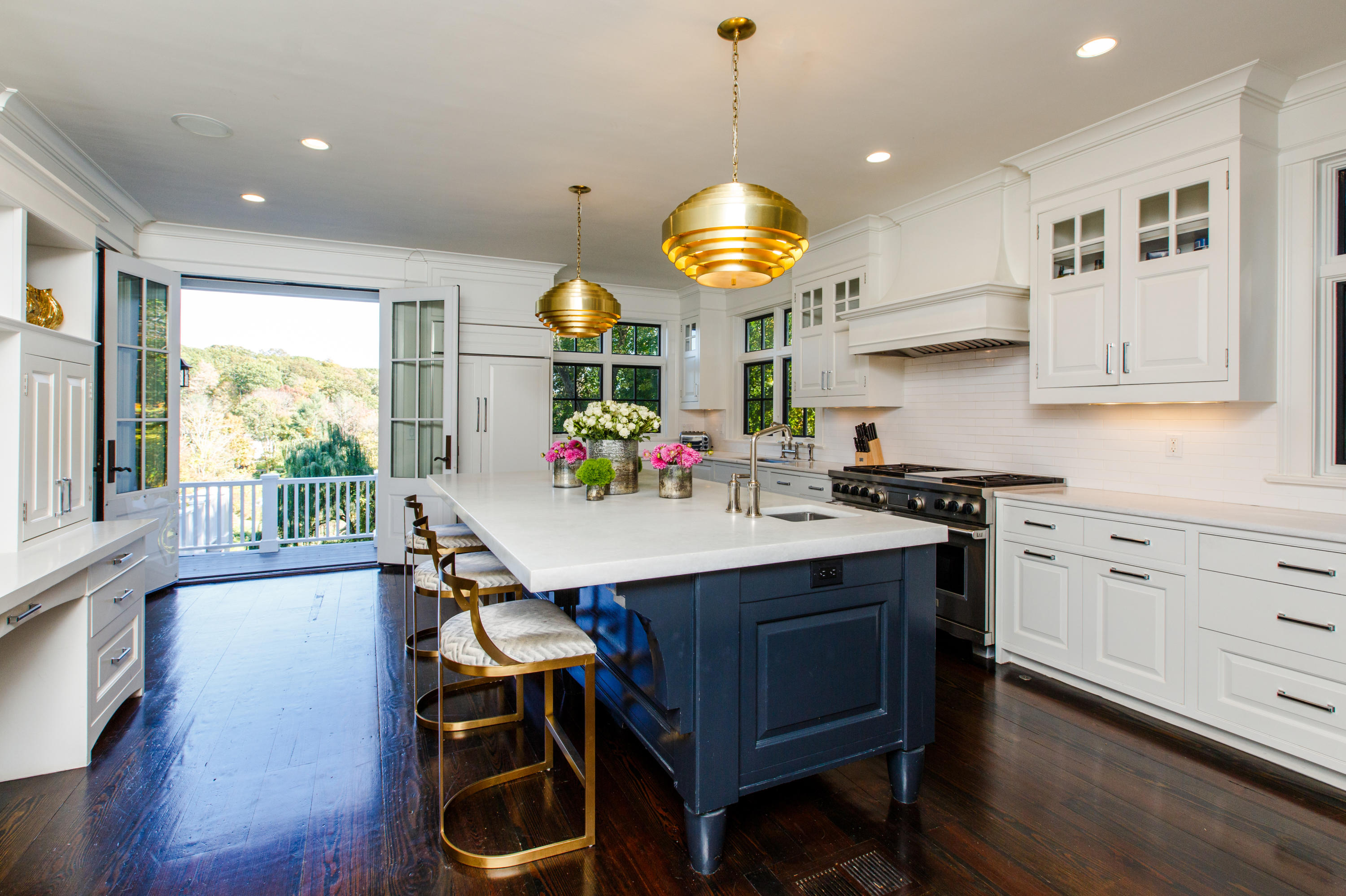 51 Lambert Road New Canaan, CT 06840 - Photo 16 of 62 a kitchen with a table and chairs in it
