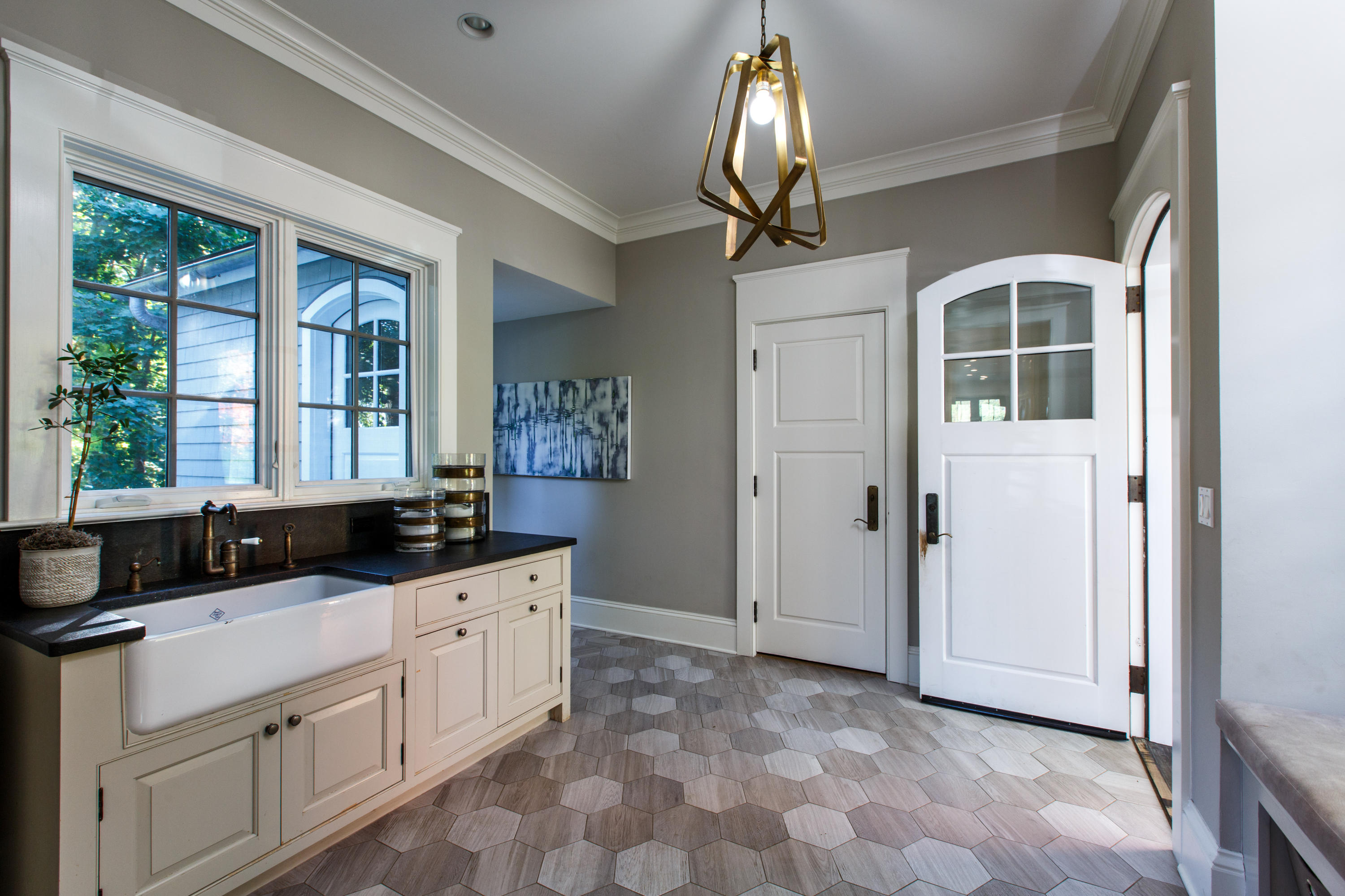 51 Lambert Road New Canaan, CT 06840 - Photo 23 of 62 a kitchen with granite countertop a sink and a stove top oven