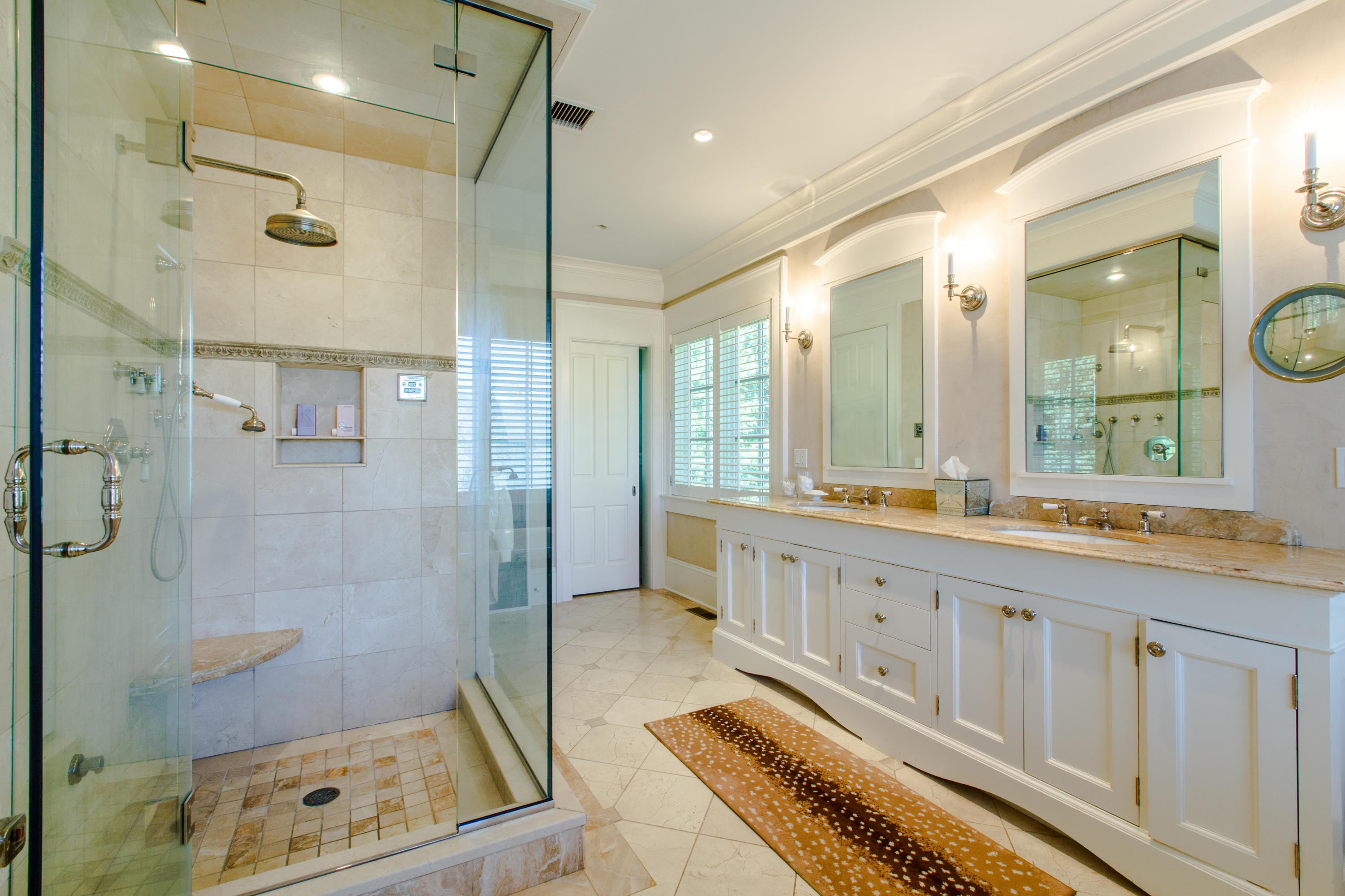 51 Lambert Road New Canaan, CT 06840 - Photo 29 of 62 a bathroom with a granite countertop sink a mirror and a shower