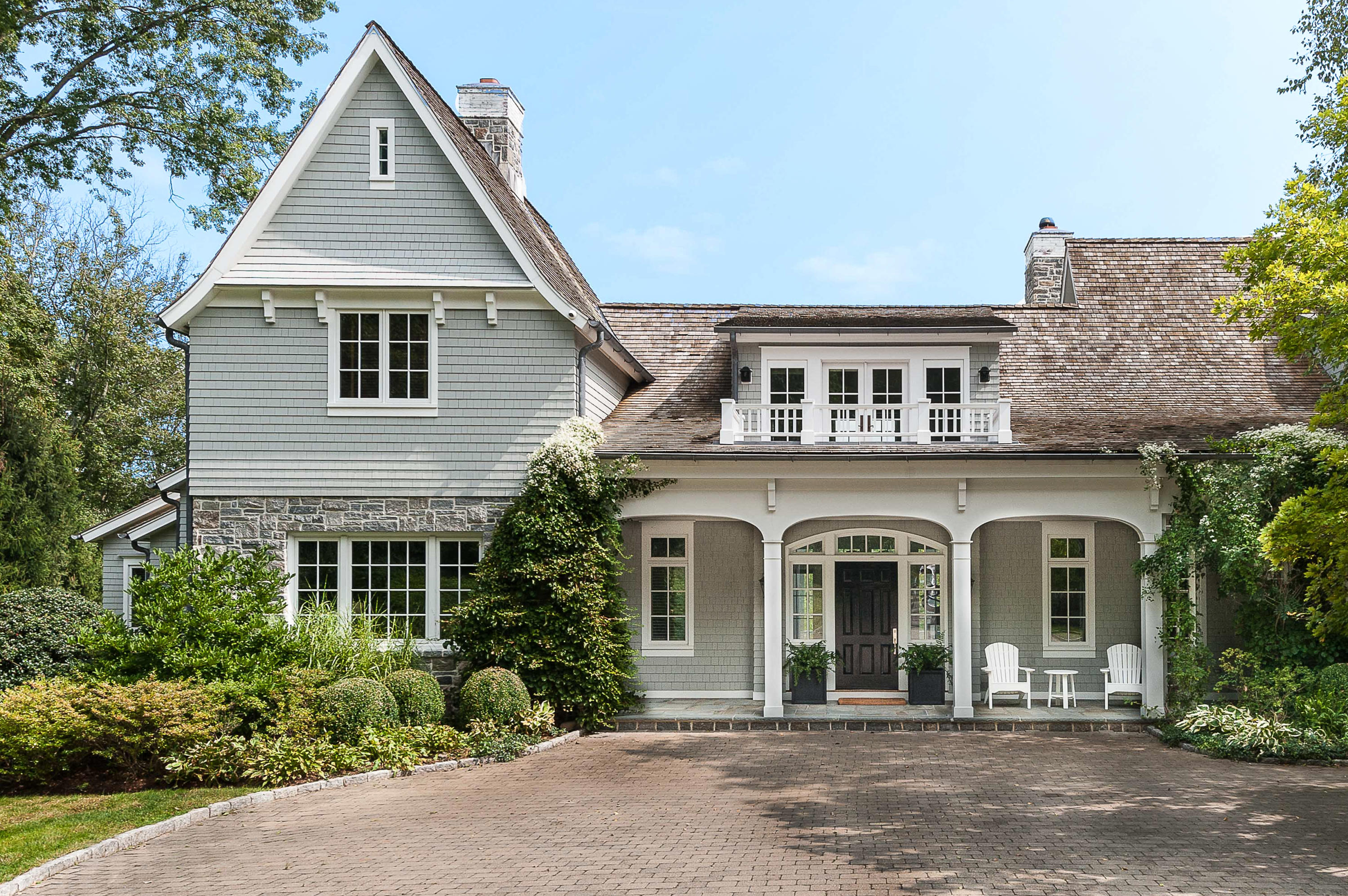 51 Lambert Road New Canaan, CT 06840 - Photo 4 of 62 front view of a house with a yard