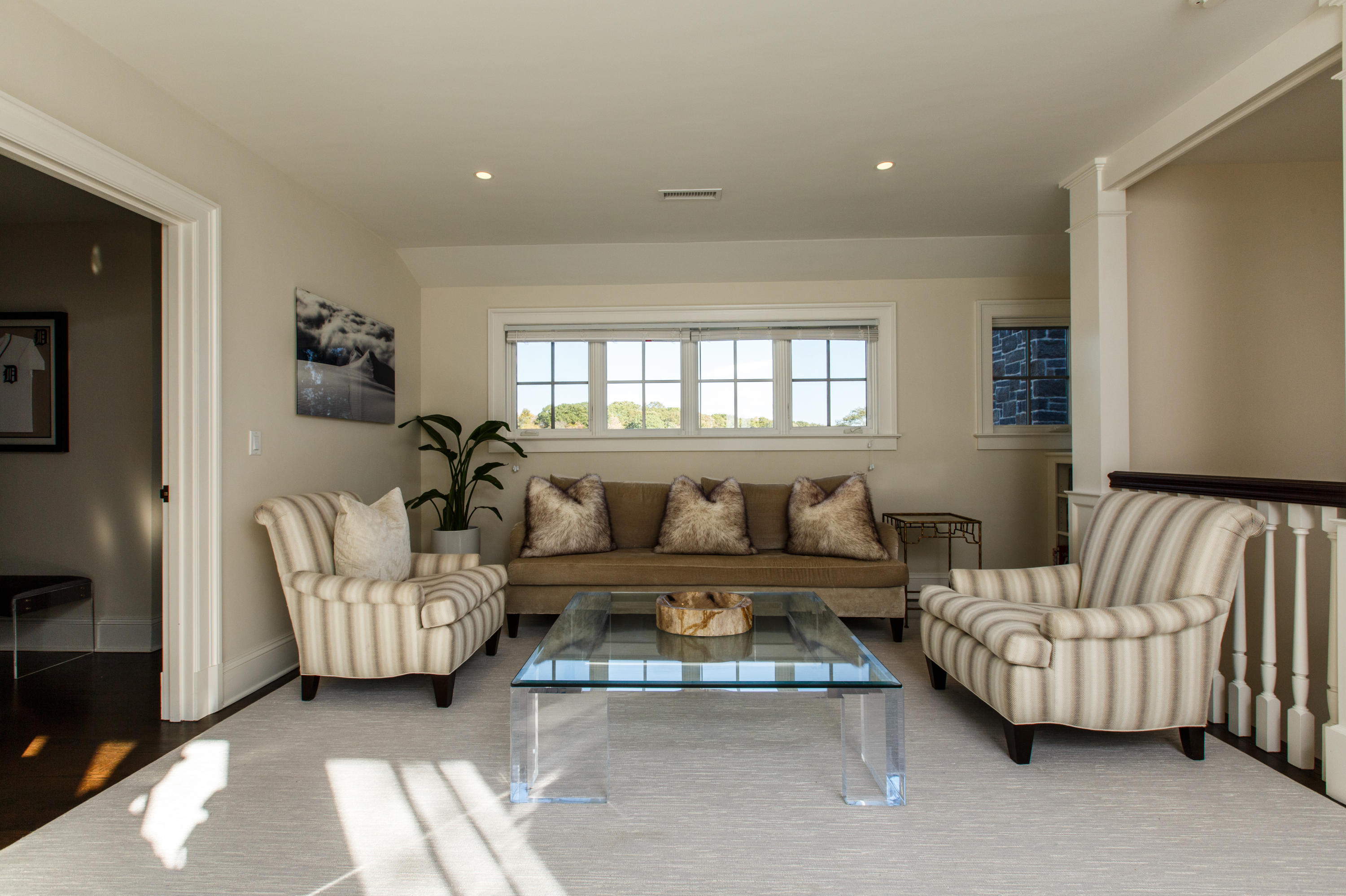51 Lambert Road New Canaan, CT 06840 - Photo 42 of 62 a living room with furniture and a large window