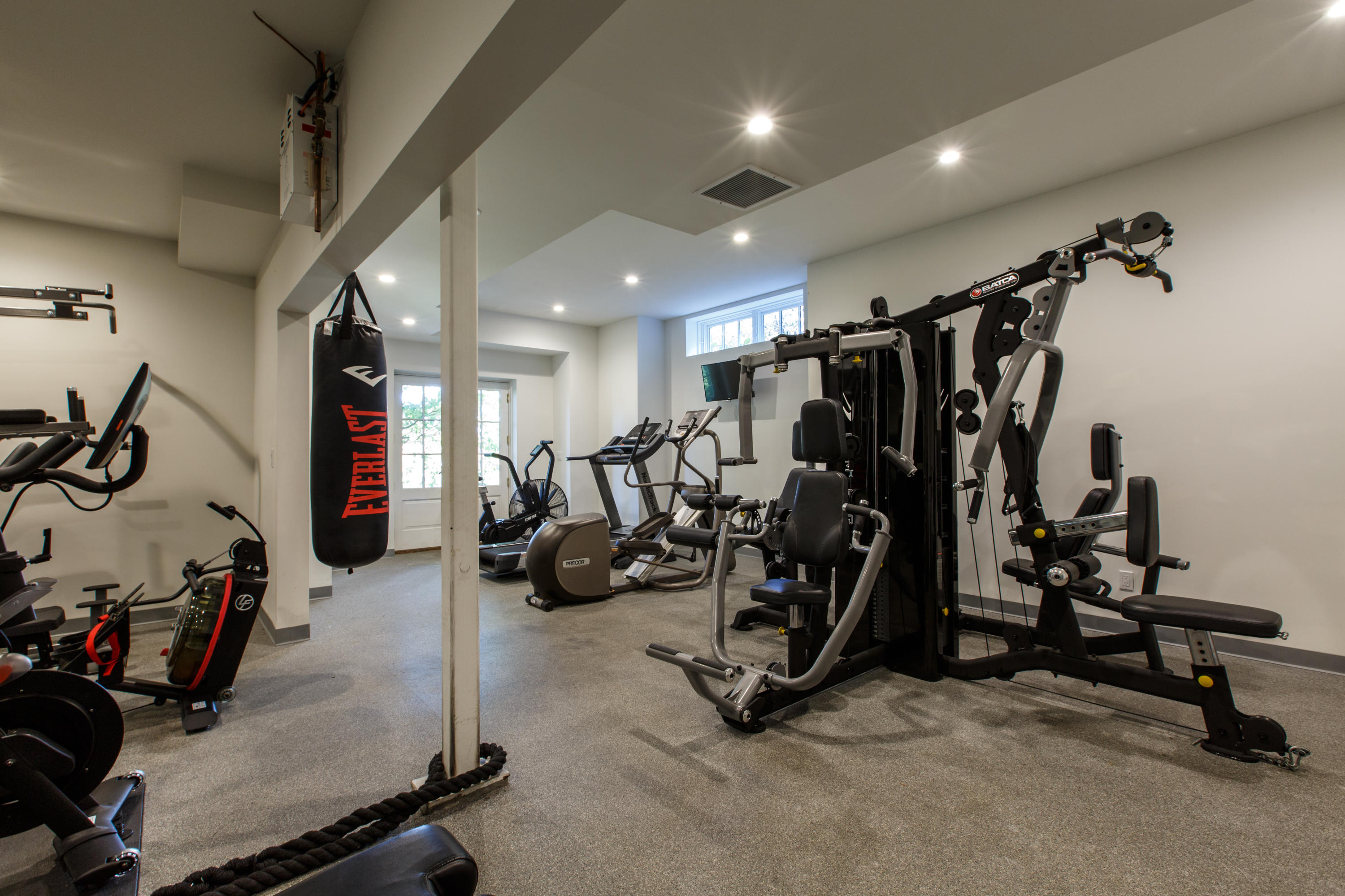 51 Lambert Road New Canaan, CT 06840 - Photo 49 of 62 a view of a room with gym equipment