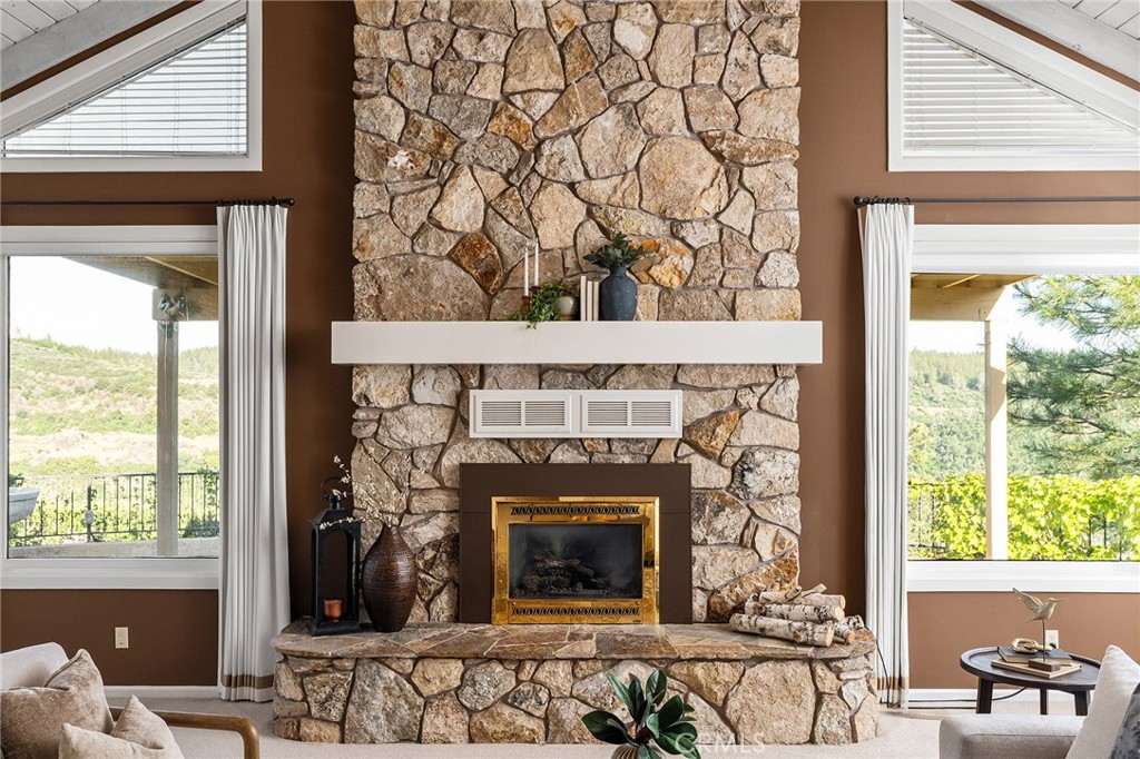 14868 Eagle Ridge Drive Forest Ranch, CA 95942 - Photo 14 of 69 a living room with a fireplace and windows