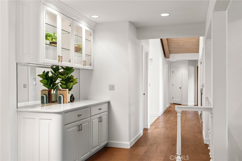 14868 Eagle Ridge Drive Forest Ranch, CA 95942 - Photo 25 of 69 a view of a hallway with wooden floor and a potted plant