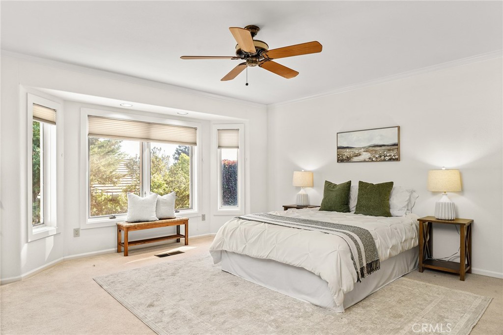 14868 Eagle Ridge Drive Forest Ranch, CA 95942 - Photo 45 of 69 a bedroom with a bed and a window