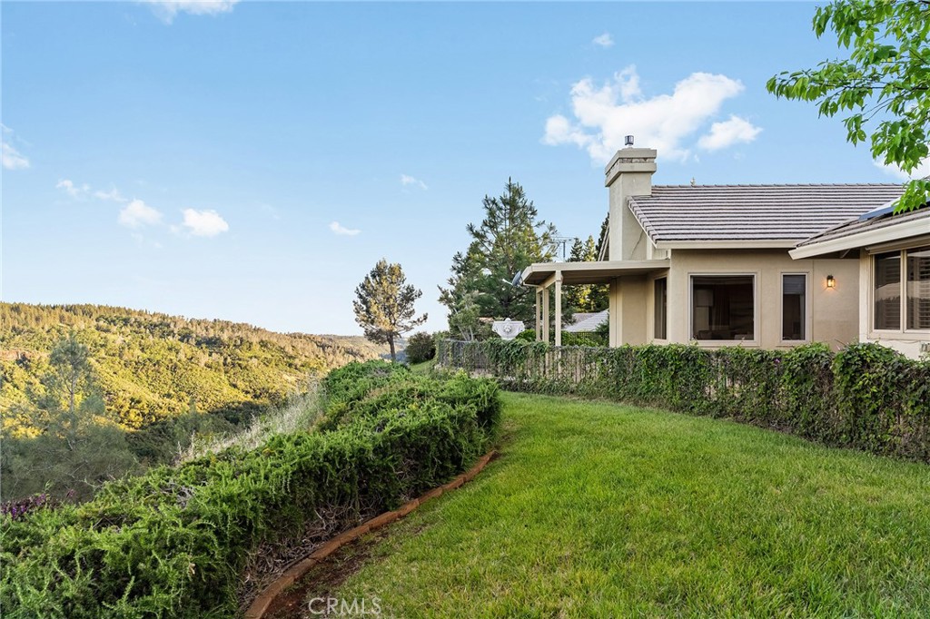 14868 Eagle Ridge Drive Forest Ranch, CA 95942 - Photo 48 of 69 a view of a house with a garden