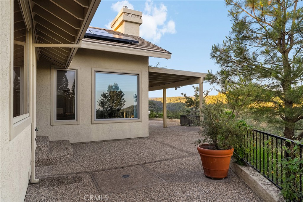 14868 Eagle Ridge Drive Forest Ranch, CA 95942 - Photo 54 of 69 a front view of a house with porch