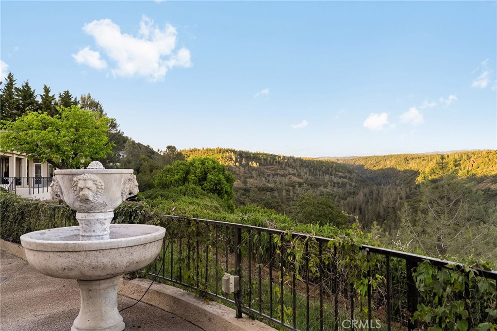 14868 Eagle Ridge Drive Forest Ranch, CA 95942 - Photo 57 of 69 a view of a fountain in the balcony with wooden floor