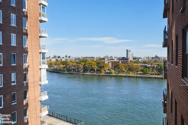 a view of a city with an ocean