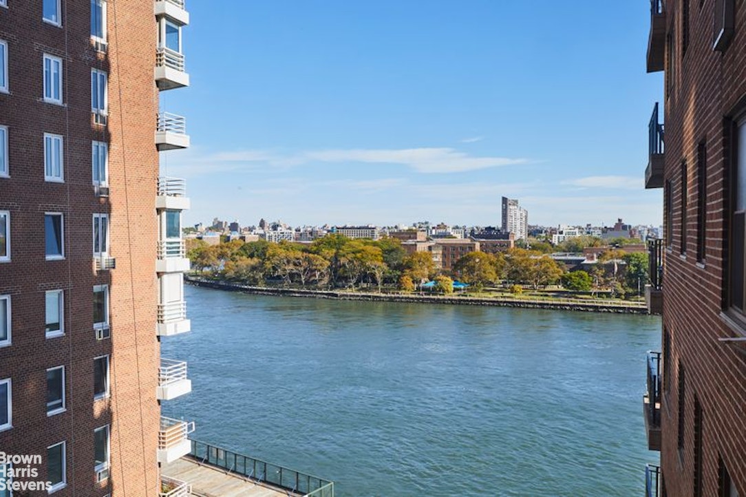 a view of a city with an ocean