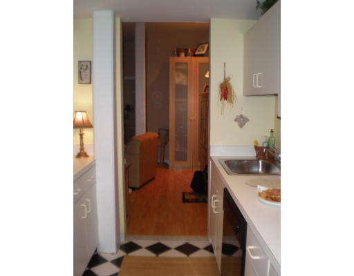 21 Linden Street, Unit 203 Quincy, MA 02170 - Photo 7 of 8 a bathroom with a sink and a mirror