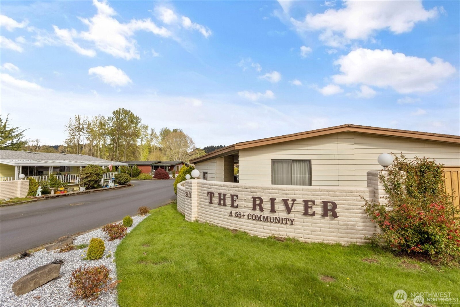 3611 I Street Northeast, Unit 72 Auburn, WA 98002 - Photo 17 of 25 a view of a house with backyard and sitting area