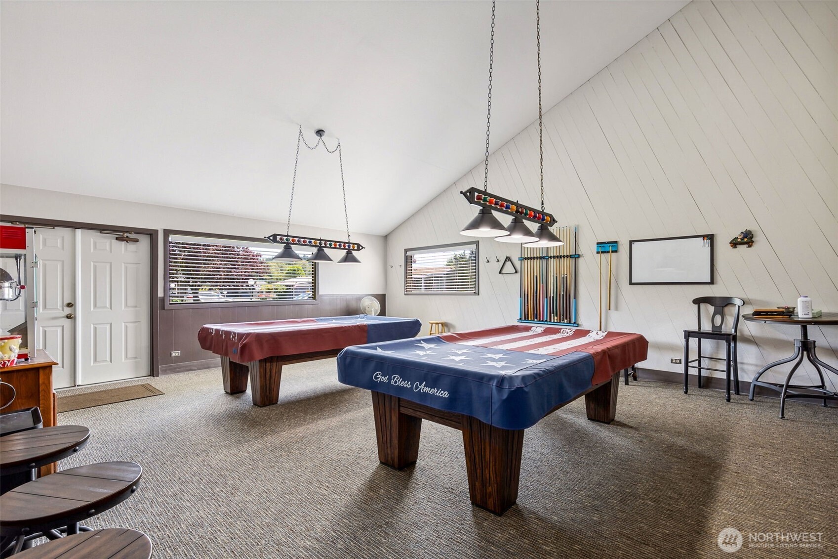 3611 I Street Northeast, Unit 72 Auburn, WA 98002 - Photo 23 of 25 a dining room with wooden floor table and chairs