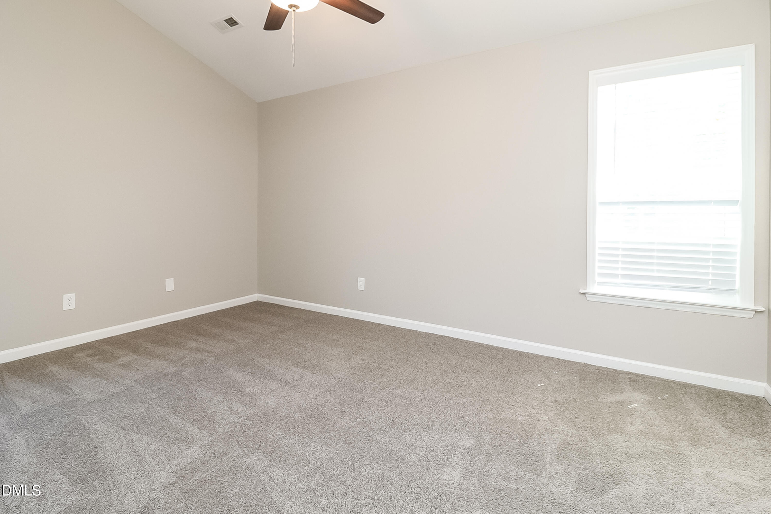 113 Nightshade Lane Garner, NC 27529 - Photo 8 of 17 an empty room with a window