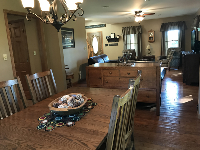 2115 East 875th Road Tonica, IL 61370 - Photo 11 of 41 a living room with furniture and a wooden floor
