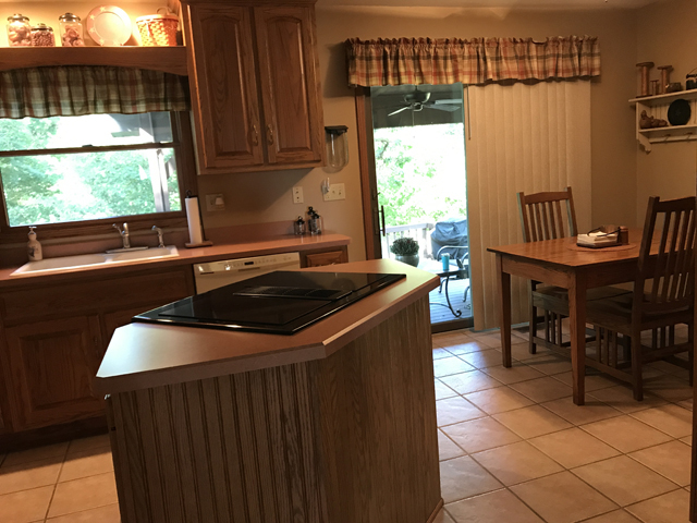 2115 East 875th Road Tonica, IL 61370 - Photo 15 of 41 a kitchen that has a sink and a stove