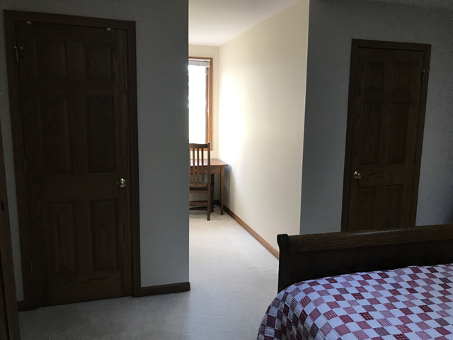 2115 East 875th Road Tonica, IL 61370 - Photo 24 of 41 a bedroom with a bed and a dresser