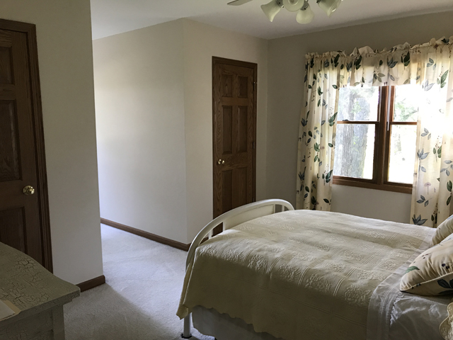 2115 East 875th Road Tonica, IL 61370 - Photo 25 of 41 a bedroom with a bed and a window