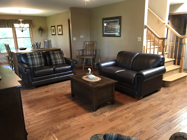 2115 East 875th Road Tonica, IL 61370 - Photo 6 of 41 a living room with furniture or couch and a wooden floor