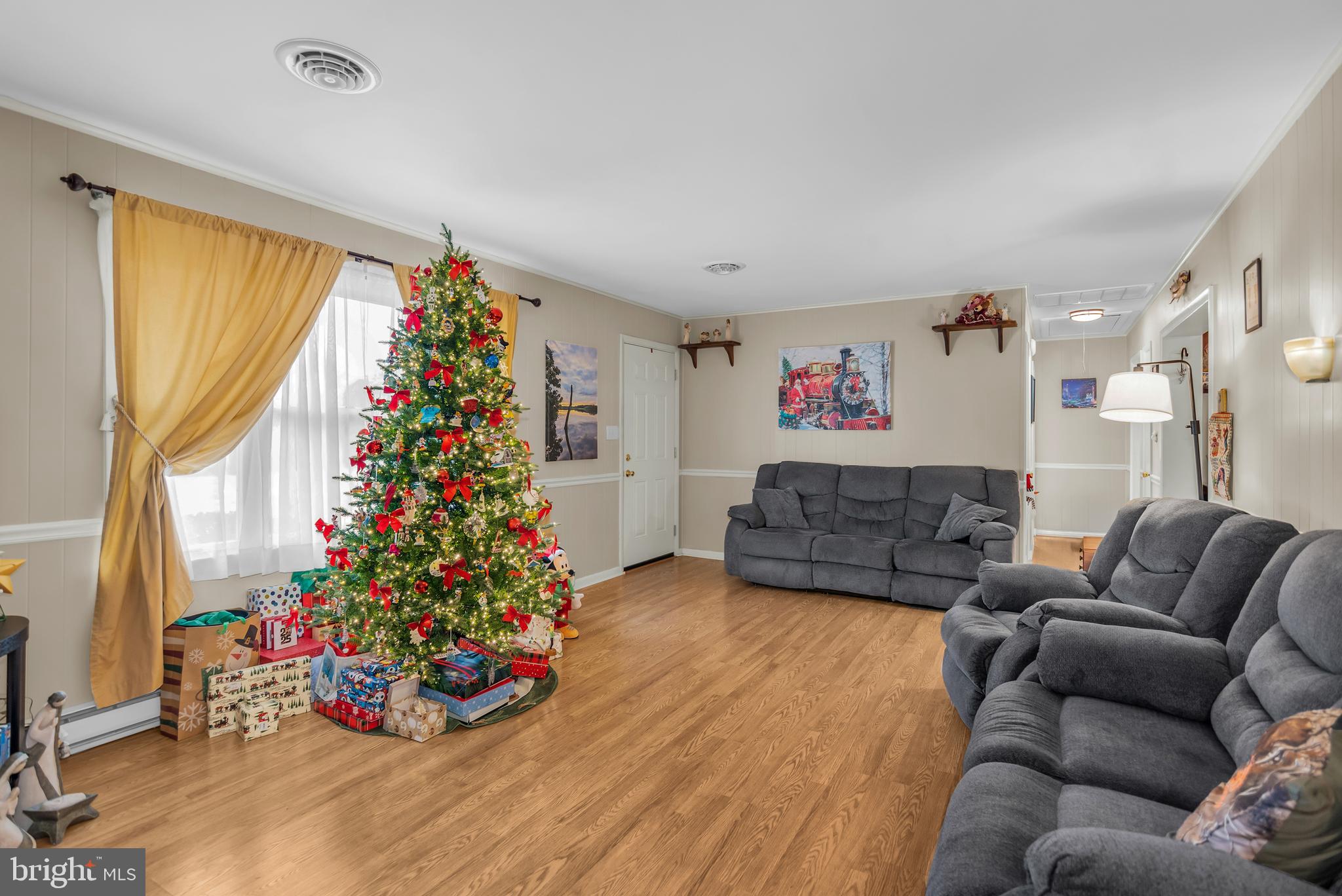24383 Robins Creek Road Preston, MD 21655 - Photo 15 of 27 a living room with furniture and a large window