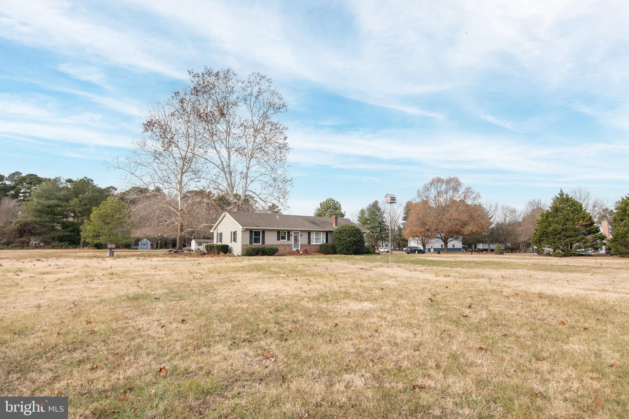 24383 Robins Creek Road Preston, MD 21655 - Photo 2 of 29 a view of an outdoor space and trees