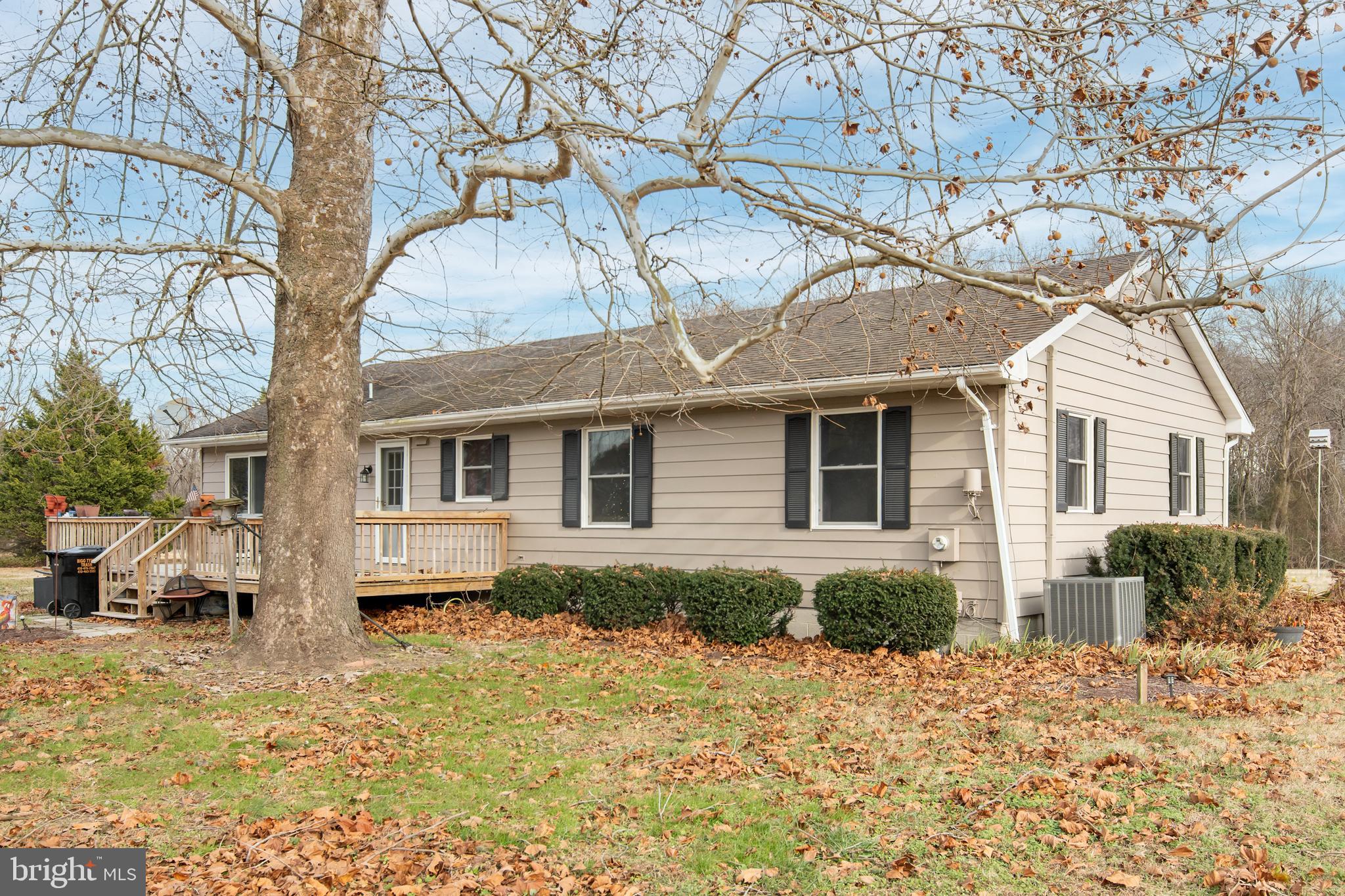 24383 Robins Creek Road Preston, MD 21655 - Photo 6 of 27 a front view of a house with a yard