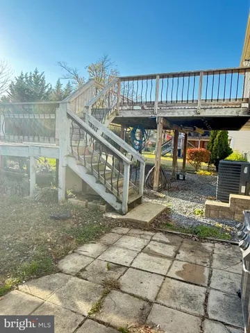 a view of swimming pool with a yard