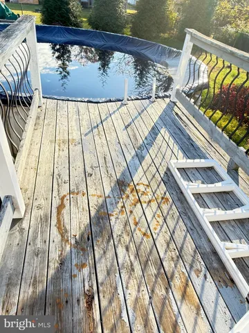 a view of a lake with houses in the background