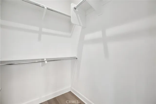 a view of an empty walk in closet