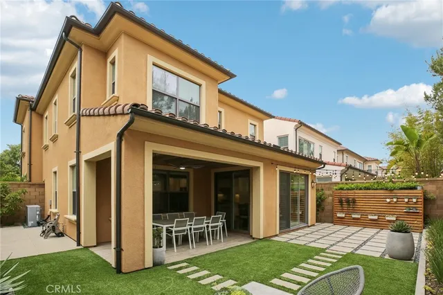 a view of a house with backyard porch and porch