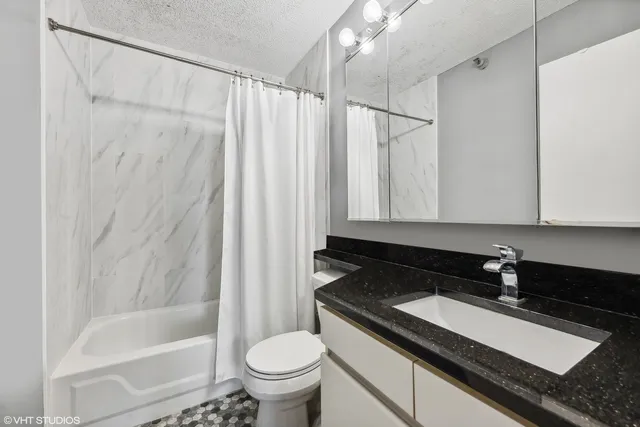 a view of a hallway with washer and dryer