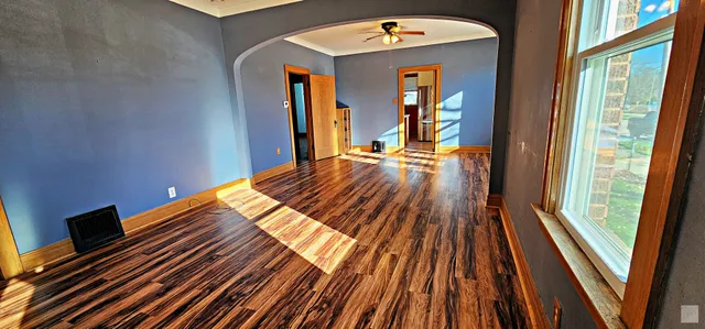 a view of outdoor space with wooden floor and furniture
