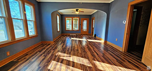 a view of a balcony with wooden floor